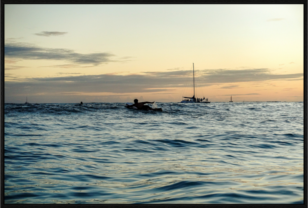 Main image Photograph of Surfer Paddling Out as Sun Sets in Waikiki