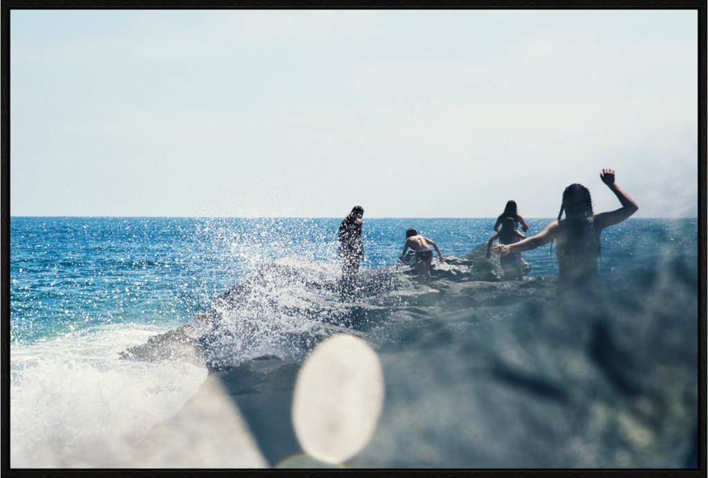 Main image Abstract Image of Girls Walking on Rock Jetty with Ocean Splashing